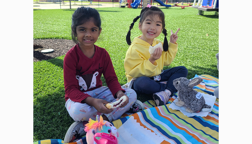 Two Challenger students enjoying Teddy Bear Picnic